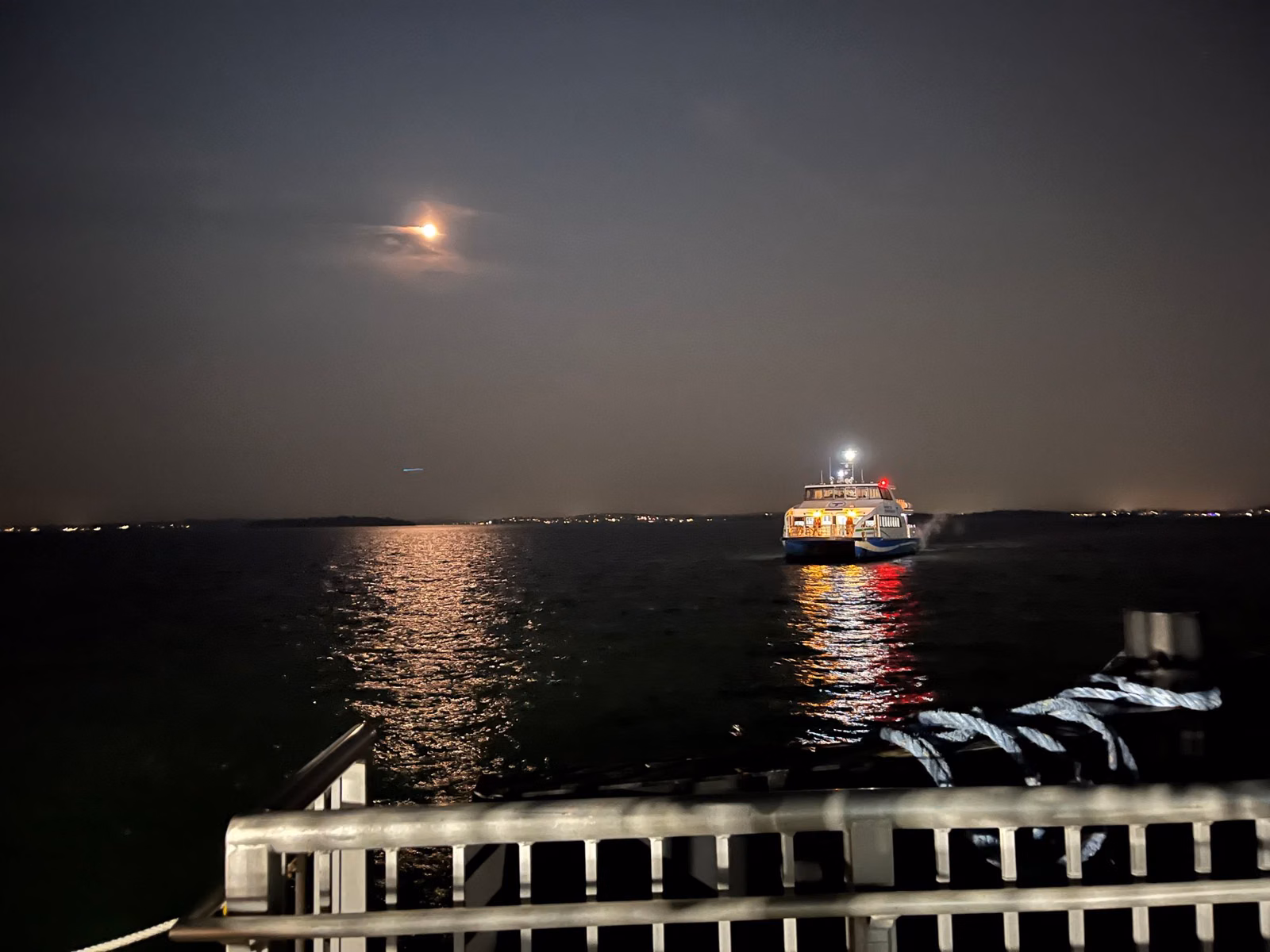 The Hingham-Hull ferry arriving at the Pemberton Point dock in Hull at night
