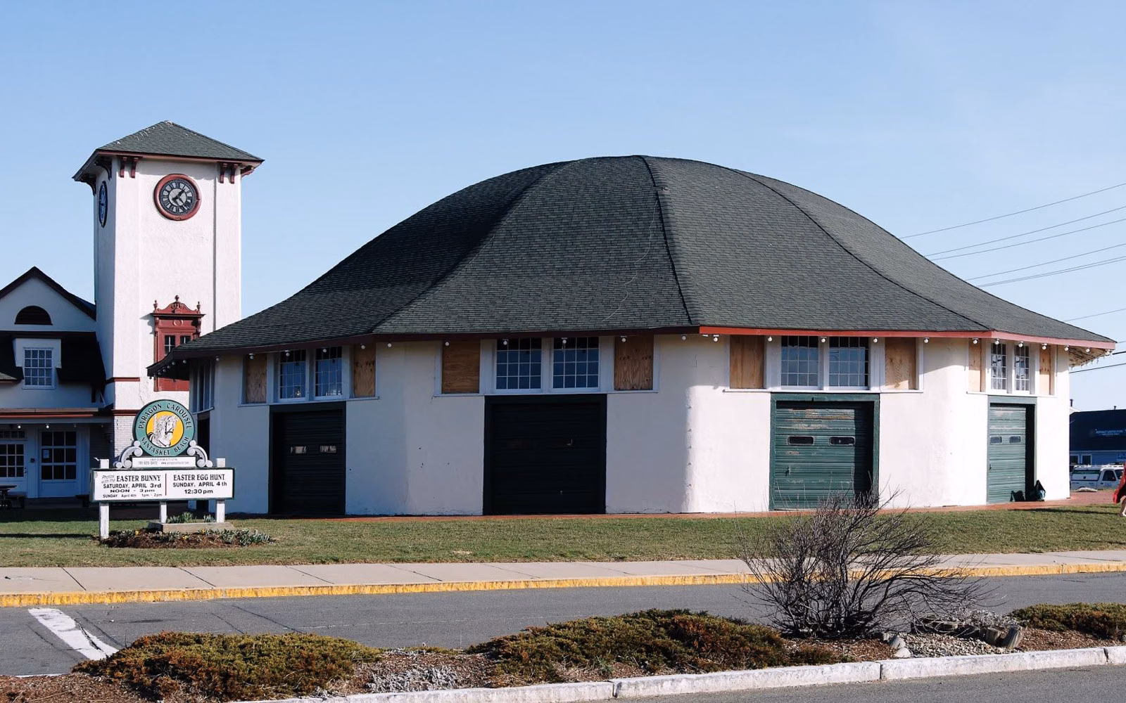The round Paragon Carousel building and clock tower on Nantasket Avenue in Hull